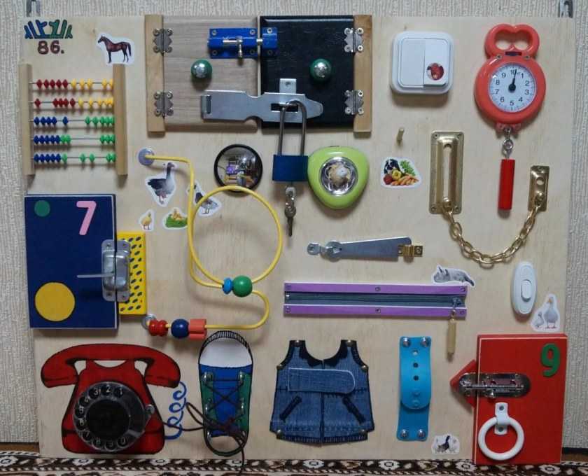 Бизиборд своими руками - развивающая доска с замочками и кнопочками (фото, мастер-класс)