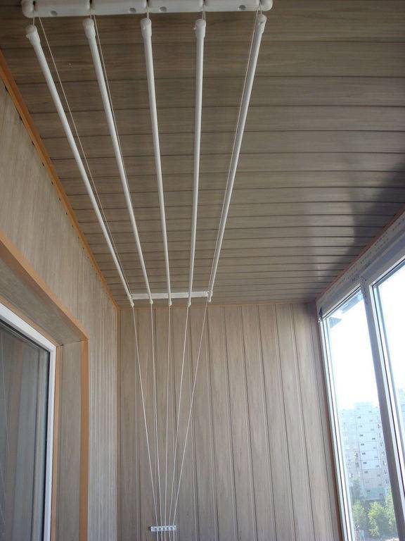 Сушилка для белья на балкон: варианты обустройства и красивого применения в дизайне интерьера (150 фото)
